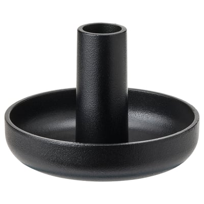 Black, round, metallic candle holder with central stem, textured finish.