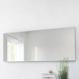 Large rectangular mirror, mounted vertically, reflects window and room. Place near a plant and books for a cozy, organized look. Safety film included.