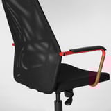 Black mesh office chair with red armrests, lumbar support, and height adjustment.