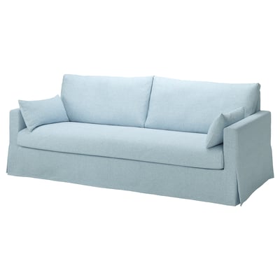 Light blue upholstered sofa, comfy with clean lines, soft fabric, three cushions.