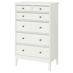 A white IDANÄS high chest of drawers with six drawers. It has a classic design with wooden knobs and slim legs, offering ample storage.