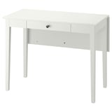 An IDANÄS white, rectangular desk with a fold-out leaf, one drawer, and four legs, perfect for versatile use.
