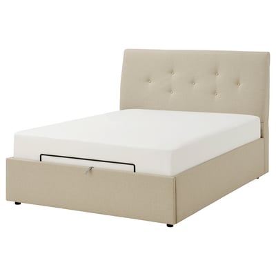 IDANÄS beige ottoman bed with tufted headboard, linen-like fabric, and storage.