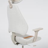 Modern office chair with adjustable headrest, back, and armrests, offering ergonomic support and comfort.