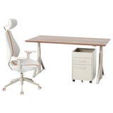An IDÅSEN home office setup with a light brown desk, adjustable white office chair with orange accents, and a beige filing cabinet on wheels.
