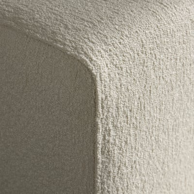 Close-up of JÄTTEBO sofas plush, textured fabric, highlighting its soft and inviting quality.