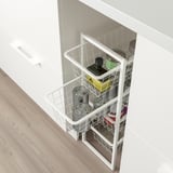 Wire shelves with containers in cabinet. JONAXEL organizes kitchen items efficiently.