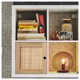 KALLAX shelf with books, decor, wicker door, gold lamp.