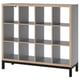 A KALLAX shelf unit in gray with light wood accents and black legs. It has a modular, cube-like design with open compartments.
