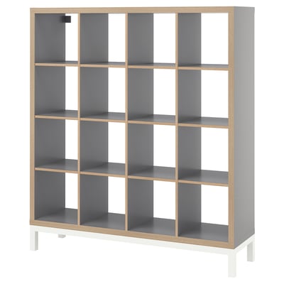 KALLAX bookshelf, grey and wooden trim, boxy shape, modular design.
