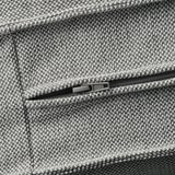 Close-up of sofa zipper, showcasing durable, textured fabric.