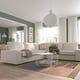 Modern living room with KIVIK sectional sofa, white coffee table, colorful rug, pendant lamps, large windows, and decor elements.