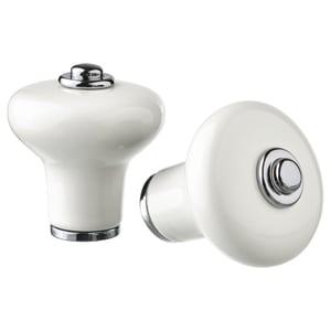 Two white porcelain-like knobs with chrome accents, rounded shape, shown from different angles.