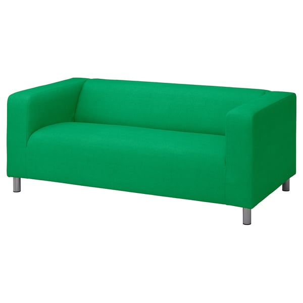 Green sofa on chrome legs, modern design.