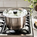 Glass lid with steam, fits various pots.