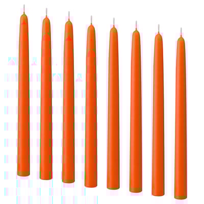 Eight tall orange candles in a line. Stearin material, unlit with cotton wicks.