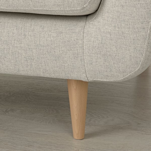 Close-up of sleek, light gray sofa with sturdy wooden leg and clean, modern design.