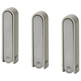 Three silver KLYKET hooks with wavy shape, perfect for hanging items, folds flat, versatile design.