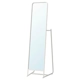 A KNAPPER white floor mirror with hooks and a rail behind it, framed in steel.