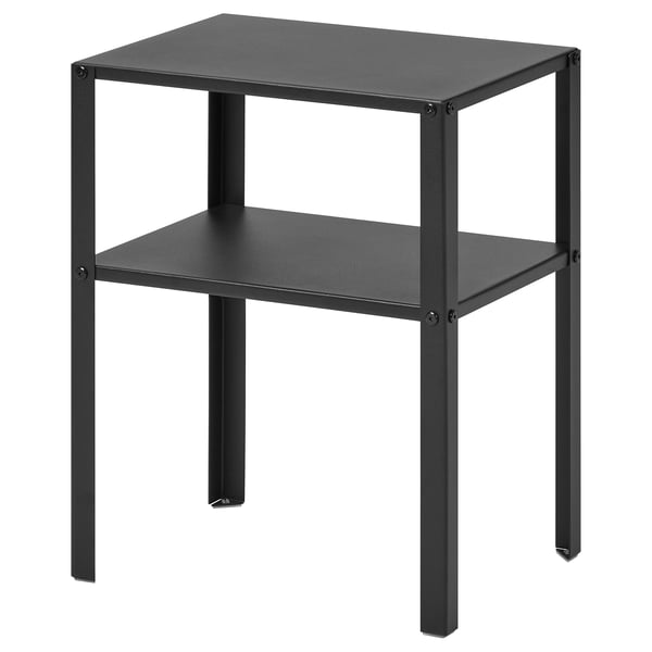 A KNARREVIK black metal bedside table with two shelves. Its sleek, practical, and easy to assemble.