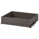 A gray KOMPLEMENT drawer, rectangular in shape with a smooth finish. Its designed for storage and has a modern, sleek appearance.