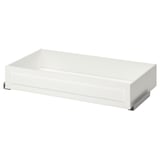 A white KOMPLEMENT framed drawer. It is rectangular with a smooth, flat surface. The drawer is designed for use in a pax wardrobe system.