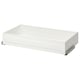 Option: A white KOMPLEMENT framed drawer. It is rectangular with a smooth, flat surface. The drawer is designed for use in a pax wardrobe system.