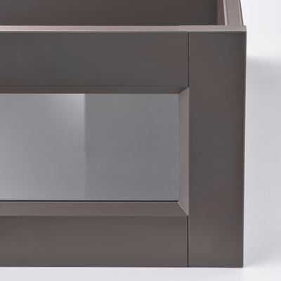 Dark gray glass-fronted drawer with sleek metal frame; high-quality design.