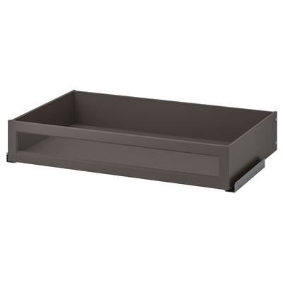 An empty, dark gray rectangular drawer with a glass bottom from the KOMPLEMENT series.