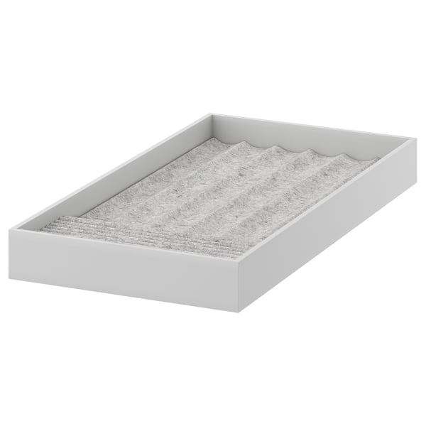 KOMPLEMENT jewelry tray, white, felt-lined compartments, rectangular shape, organized design.