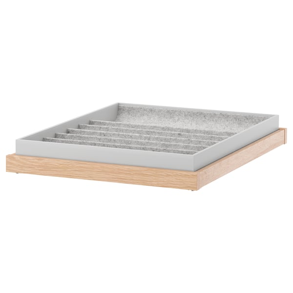 A light wood and gray drawer organizer for storage. It multiple compartments to keep items visible and accessible.