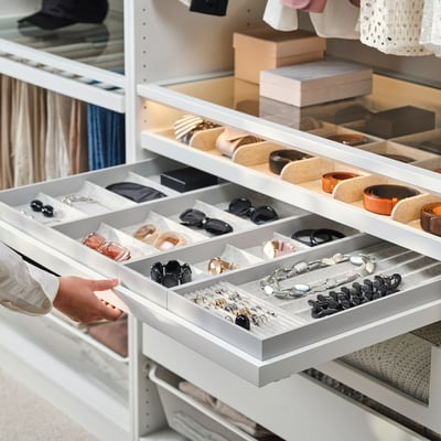 IKEA KOMPLEMENT white organizer tray, felt-lined, segmented for accessories.