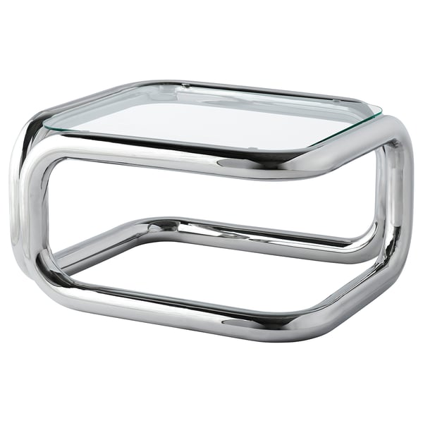 KONSTRUNDA chrome side table: sleek, steel frame, geometric shape, clear glass top, modern design.