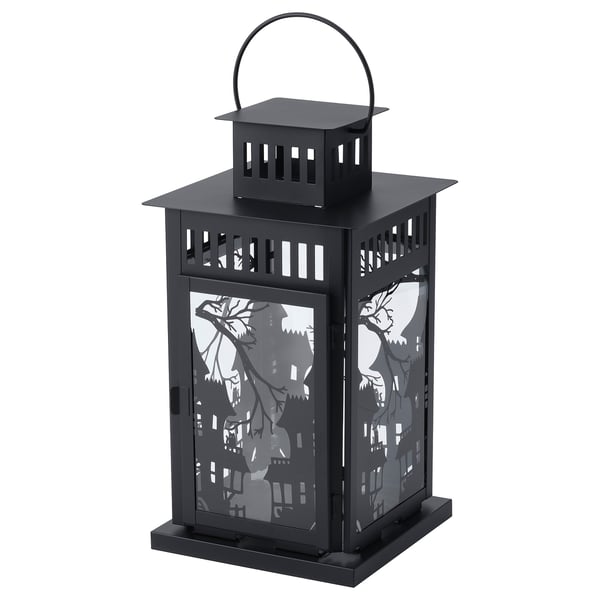 Black KUSTFYR lantern, haunted design, metal & glass, for halloween.