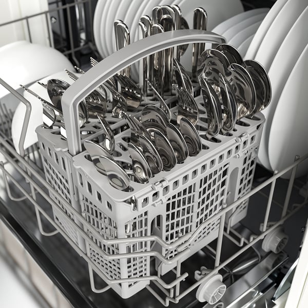 Dishwashers cutlery holder with gleaming utensils, upper and lower racks visible.