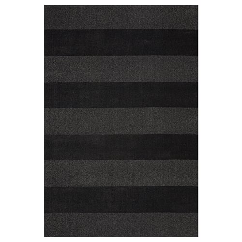 Dark grey striped rug, rectangular, soft low pile, timeless pattern.