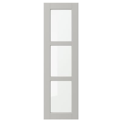 A light grey LERHYTTAN kitchen cabinet door with a solid wood frame and beveled edges featuring tempered glass panels.