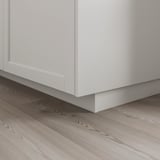 White kitchen plinth covering floor gap, part of LERHYTTAN series, fits metod cabinets.
