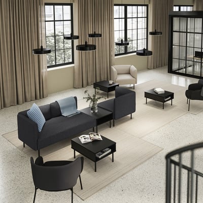 Modern living room with gray sofa, black coffee tables, chairs, and pendant lights. Large windows with curtains.