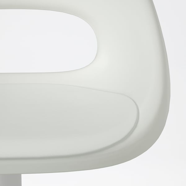 Close-up of sleek, white plastic chair seat and backrest, smooth and modern.