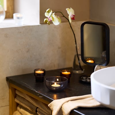 LOTSFÅGEL Scented tealight, Peach light orange, 3.5 hr