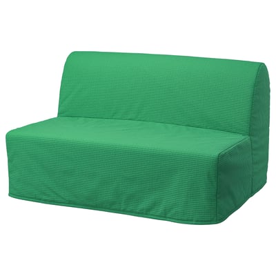 Bright green, folded textured fabric, soft and inviting, likely a bed cover.