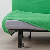 Bright green sofa bed with gray cushion, set on black rolling base. Easy convert for comfort and sleep.