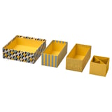 Four yellow storage boxes: two patterned, two plain yellow. Square, rectangular shapes. Made from recycled paperboard. Perfect for organizing items.