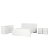Displays a white MALM bedroom set, featuring a modern bed frame, two nightstands, and a chest with six drawers.