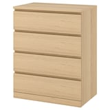 An IKEA MALM light oak wooden chest of drawers with four smooth-running drawers, designed to be anchored to the wall for safety.