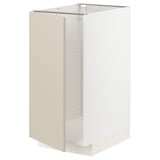 A white and beige METOD kitchen cabinet with sleek, smooth surfaces and modern design.