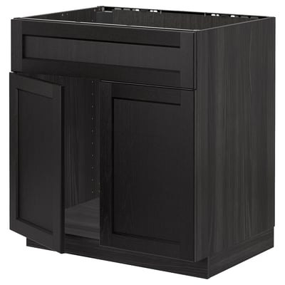 Black kitchen cabinet with shrimp-shaped design and dark stained wood finish.