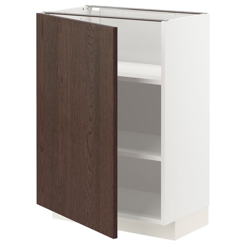 Dark wood cabinet door open, revealing white shelves inside.