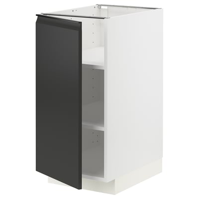 Modern kitchen cabinet: METOD in white and black with matte finish and adjustable shelves.